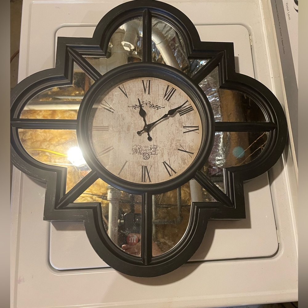 Pretty glass fronted black Clock
